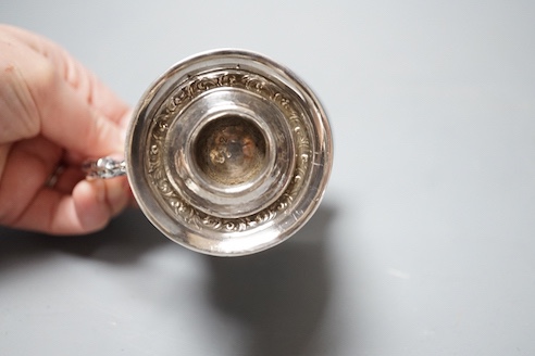 A Victorian embossed silver christening mug, Edward & John Barnard, London, 1856, 9cm, 149 grams.